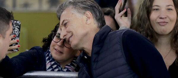 Argentina's President Mauricio Macri takes a selfie with supporters after casting his vote during midterm legislative elections in Buenos Aires, Argentina, Sunday, Oct. 22, 2017. Argentina's President Mauricio Macri takes a selfie with supporters after casting his vote during midterm legislative elections in Buenos Aires, Argentina, Sunday, Oct. 22, 2017. - Sputnik International