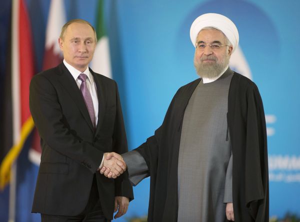 November 23, 2015. Russian President Vladimir Putin, left, and President of the Islamic Republic of Iran Hassan Rouhani meet prior to the summit of the heads of state and government of the Gas Exporting Countries Forum in Tehran. (File) November 23, 2015. Russian President Vladimir Putin, left, and President of the Islamic Republic of Iran Hassan Rouhani meet prior to the summit of the heads of state and government of the Gas Exporting Countries Forum in Tehran. (File) - Sputnik International