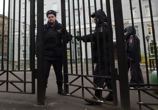 Police officers outside polytechnic college No. 42 on Gvardeiskaya Street in Moscow where dead bodies of a teacher and student were found Police officers outside polytechnic college No. 42 on Gvardeiskaya Street in Moscow where dead bodies of a teacher and student were found - Sputnik International