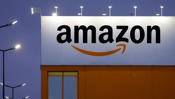 The logo of Amazon is seen at the company logistics center in Lauwin-Planque, northern France, February 20, 2017. - Sputnik International