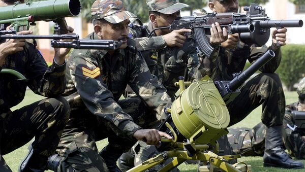 Indian army soldiers display a selection of the latest weapons including a Multi-shot grenade launcher, AK47 Kalashnikov rifles and a Flame Launcher at an Infantry Weapons Equipment display in New Delhi. (File) - Sputnik International