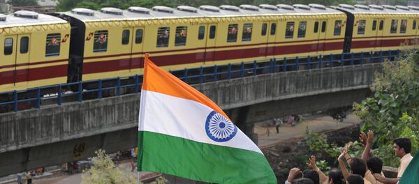 (File) Indian school students wave to greet a Kolkata Metro coach during its inaugural run in Kolkata on August 22, 2009 (File) Indian school students wave to greet a Kolkata Metro coach during its inaugural run in Kolkata on August 22, 2009 - Sputnik International