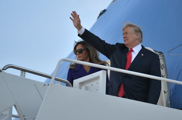 US President Donald Trump and First Lady Melania Trump board Air Force One departing from Andrews Air Force Base, Maryland on November 3, 2017, embarking on a 11-day tour of Asia US President Donald Trump and First Lady Melania Trump board Air Force One departing from Andrews Air Force Base, Maryland on November 3, 2017, embarking on a 11-day tour of Asia - Sputnik International