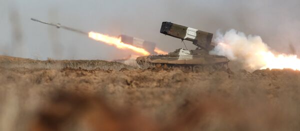 The TOS-1A multiple rocket launcher. File photo The TOS-1A multiple rocket launcher. File photo - Sputnik International
