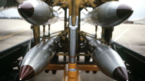 A frontal view of four B-61 nuclear free-fall bombs on a bomb cart - Sputnik International