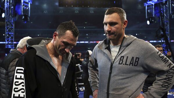 Wladimir Klitschko's with his brother Vitali, right, after losing to British boxer Anthony Joshua following their fight for Joshua's IBF and the vacant WBA Super World and IBO heavyweight titles, at Wembley Stadium, in London, Saturday, April 29, 2017 - Sputnik International