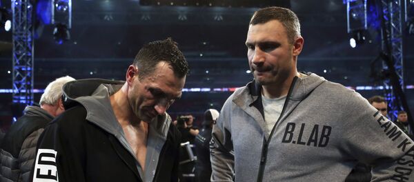 Wladimir Klitschko's with his brother Vitali, right, after losing to British boxer Anthony Joshua following their fight for Joshua's IBF and the vacant WBA Super World and IBO heavyweight titles, at Wembley Stadium, in London, Saturday, April 29, 2017 - Sputnik International
