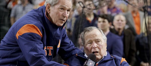 Former Presidents George H.W. Bush and George W. Bush make the play ball announcement before Game 5 of baseball's World Series against the Los Angeles Dodgers Sunday, Oct. 29, 2017, in Houston Former Presidents George H.W. Bush and George W. Bush make the play ball announcement before Game 5 of baseball's World Series against the Los Angeles Dodgers Sunday, Oct. 29, 2017, in Houston - Sputnik International
