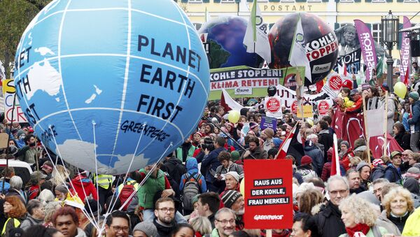 Protestors demand the implementation of the climate change convention in Bonn, Germany, Saturday, Nov. 4, 2017. The Climate summit starts Monday Nov. 6, in Bonn. - Sputnik International