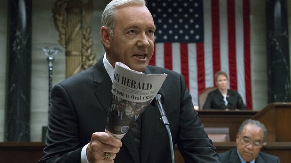 This image released by Netflix shows Kevin Spacey in a scene from House Of Cards. Netflix says it's suspending production on House of Cards following harassment allegations against Spacey - Sputnik International
