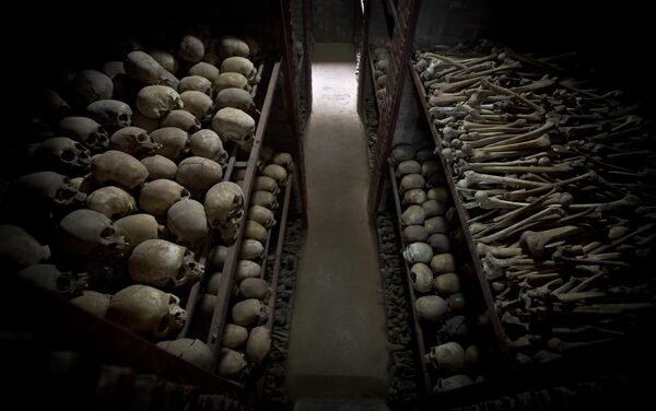 The skulls and bones of some of those who were slaughtered as they sought refuge inside the church, are laid out on shelves in an underground vault as a memorial to the thousands who were killed in and around the Catholic church during the 1994 genocide in Nyamata, Rwanda, Friday, April 4, 2014 The skulls and bones of some of those who were slaughtered as they sought refuge inside the church, are laid out on shelves in an underground vault as a memorial to the thousands who were killed in and around the Catholic church during the 1994 genocide in Nyamata, Rwanda, Friday, April 4, 2014 - Sputnik International