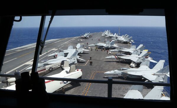 Fighter jets on board the U.S. Navy aircraft carrier USS Carl Vinson. File photo Fighter jets on board the U.S. Navy aircraft carrier USS Carl Vinson. File photo - Sputnik International