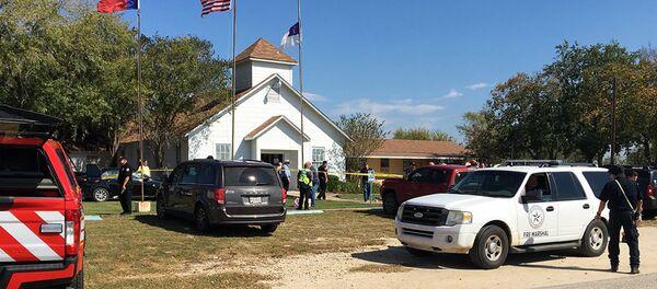 Emergency personnel respond to a fatal shooting at a Baptist church in Sutherland Springs, Texas, Sunday, Nov. 5, 2017. ( - Sputnik International