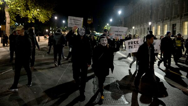 Demonstrators take part in the Million Mask March in London, Britain November 5, 2017. - Sputnik International