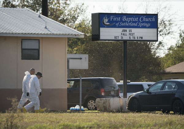 Members of the FBI walk next to the First Baptist Church of Sutherland Springs after a fatal shooting, Sunday, Nov. 5, 2017, in Sutherland Springs, Texas. Members of the FBI walk next to the First Baptist Church of Sutherland Springs after a fatal shooting, Sunday, Nov. 5, 2017, in Sutherland Springs, Texas. - Sputnik International