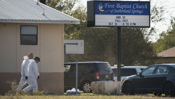 Members of the FBI walk next to the First Baptist Church of Sutherland Springs after a fatal shooting, Sunday, Nov. 5, 2017, in Sutherland Springs, Texas. - Sputnik International