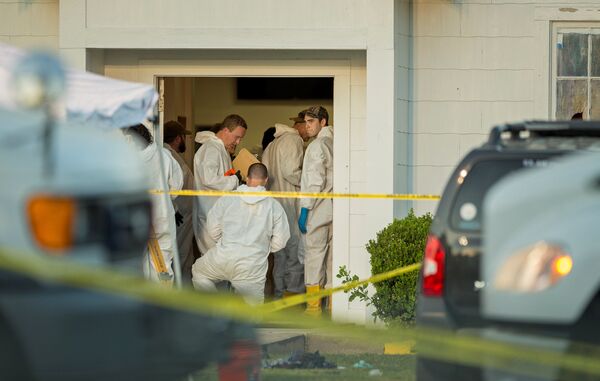 Law enforcement officials investigate a mass shooting at the First Baptist Church in Sutherland Springs, Texas, U.S. November 5, 2017 Law enforcement officials investigate a mass shooting at the First Baptist Church in Sutherland Springs, Texas, U.S. November 5, 2017 - Sputnik International