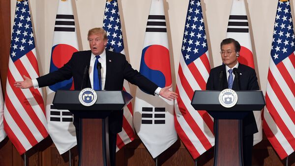 U.S. President Donald Trump gestures as he speaks during a joint press conference with South Korea's President Moon Jae-in at the presidential Blue House in Seoul, South Korea - Sputnik International