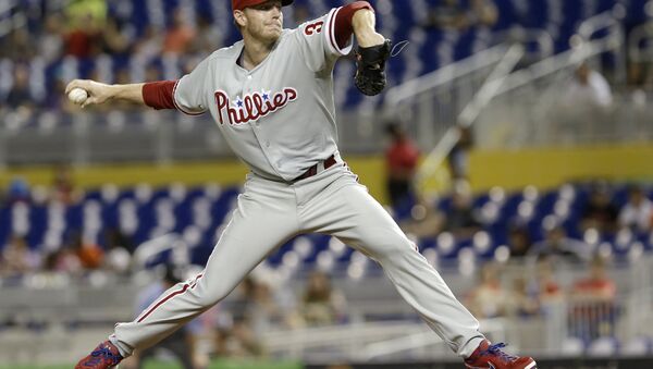 Philadelphia Phillies' Roy Halladay pitches against the Miami Marlins in the first inning of a baseball game, Monday, Sept. 23, 2013, in Miami. - Sputnik International
