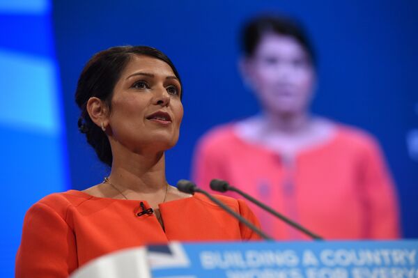 Britain's International Development Secretary Priti Patel delivers her speech on the third day of the Conservative Party annual conference at the Manchester Central Convention Centre in Manchester on October 3, 2017. Britain's International Development Secretary Priti Patel delivers her speech on the third day of the Conservative Party annual conference at the Manchester Central Convention Centre in Manchester on October 3, 2017. - Sputnik International
