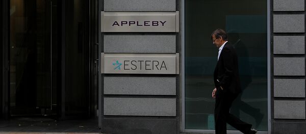 A man walks past the offices of Appleby in St Helier, Jersey, Britain November 7, 2017 - Sputnik International