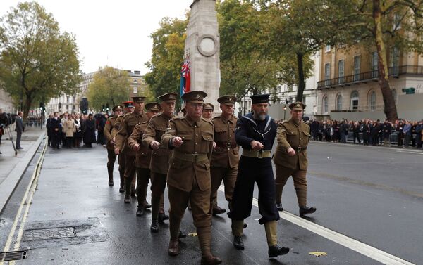 Members of the Western Front Association wearing historical military uniform, march away from the Cenotaph following a service to remember servicemen and women killed conflict, in London, Britain November 11, 2017 - Sputnik International