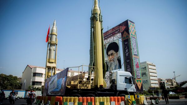 A display featuring missiles and a portrait of Iran's Supreme Leader Ayatollah Ali Khamenei is seen at Baharestan Square in Tehran, Iran September 27, 2017 - Sputnik International