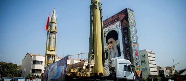 A display featuring missiles and a portrait of Iran's Supreme Leader Ayatollah Ali Khamenei is seen at Baharestan Square in Tehran, Iran September 27, 2017 - Sputnik International