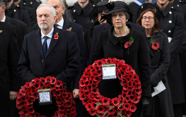 Britain's Prime Minister Theresa May and Leader of the opposition Labour Party Jeremy Corbyn wait to lay wreathes at the Remembrance Sunday Cenotaph service in London, Britain, November 12, 2017 - Sputnik International