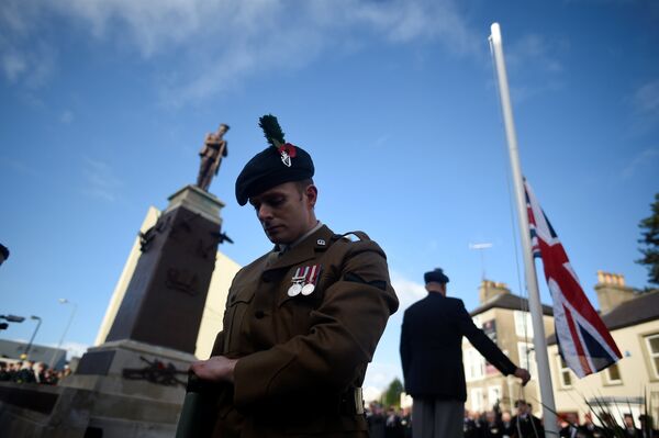 The Union flag is lowered to half mast during the Remembrance Sunday Cenotaph wreathe laying ceremony and commemoration of the 30th anniversary of the IRA Enniskillen bombing in Enniskillen, Northern Ireland, November 12, 2017 The Union flag is lowered to half mast during the Remembrance Sunday Cenotaph wreathe laying ceremony and commemoration of the 30th anniversary of the IRA Enniskillen bombing in Enniskillen, Northern Ireland, November 12, 2017 - Sputnik International
