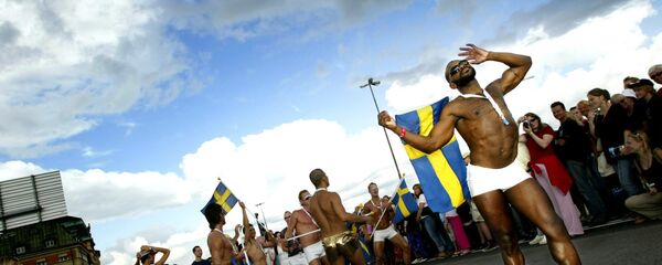 Unidentified participants enjoy the annual Gay Pride Parade as it makes its way through central Stockholm, Sweden (File) - Sputnik International