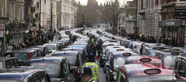London taxis block the roads in central London, Wednesday, Feb. 10, 2016. Drivers are concerned with unfair competition from services such as Uber. London taxis block the roads in central London, Wednesday, Feb. 10, 2016. Drivers are concerned with unfair competition from services such as Uber. - Sputnik International