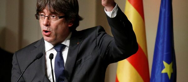 Former Catalan leader Carles Puigdemont gestures while delivering a speech to Catalan mayors in Brussels, Belgium, November 7, 2017. Former Catalan leader Carles Puigdemont gestures while delivering a speech to Catalan mayors in Brussels, Belgium, November 7, 2017. - Sputnik International