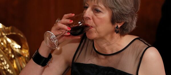 Britain's Prime Minister Theresa May drinks a toast at the Lord Mayor's Banquet at the Guildhall, in London, Britain Britain's Prime Minister Theresa May drinks a toast at the Lord Mayor's Banquet at the Guildhall, in London, Britain - Sputnik International