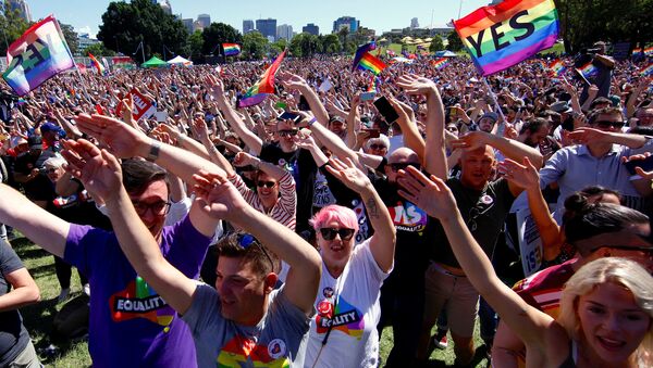 Supporters of the 'Yes' vote for marriage equality celebrate after it was announced the majority of Australians support same-sex marriage in a national survey, paving the way for legislation to make the country the 26th nation to formalise the unions by the end of the year, at a rally in central Sydney, Australia, November 15, 2017 - Sputnik International