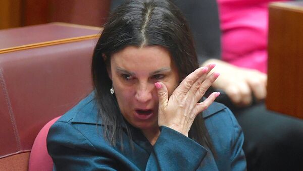 Jacqui Lambie, an independent and outspoken senator for the island state of Tasmania, reacts after delivering a statement regarding her resignation in the Senate chamber at Parliament House in Canberra, Australia, November 14, 2017. - Sputnik International