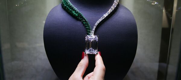 A necklace, known as Creation I, featuring a 163.41 carat D-Colour Flawless diamond, and created by Swiss jewellers de GRISOGONO, is pictured during a photocall. - Sputnik International