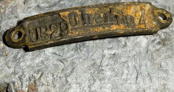 A plate recovered from the torpedo cabin of a World War I German submarine, identifying it as UB-29, is on exhibit for the media in Brugge, Belgium, Tuesday, Nov. 14, 2017. A plate recovered from the torpedo cabin of a World War I German submarine, identifying it as UB-29, is on exhibit for the media in Brugge, Belgium, Tuesday, Nov. 14, 2017. - Sputnik International
