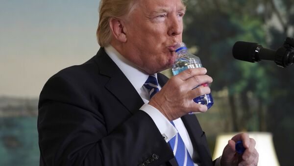 President Donald Trump pauses to drink water as he speaks in the Diplomatic Reception Room of the White House, Wednesday, Nov. 15, 2017 in Washington - Sputnik International