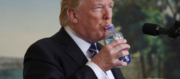 President Donald Trump pauses to drink water as he speaks in the Diplomatic Reception Room of the White House, Wednesday, Nov. 15, 2017 in Washington - Sputnik International