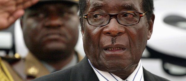 Zimbabwe President Robert Mugabe attends the launch of basic commodities in Harare, Zimbabwe July 16, 2008 Zimbabwe President Robert Mugabe attends the launch of basic commodities in Harare, Zimbabwe July 16, 2008 - Sputnik International