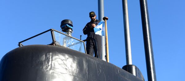 A crew member of the Argentine military submarine ARA San Juan stands on the vessel at the port of Buenos Aires, Argentina June 2, 2014 A crew member of the Argentine military submarine ARA San Juan stands on the vessel at the port of Buenos Aires, Argentina June 2, 2014 - Sputnik International