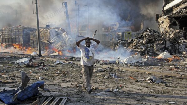 Последствия взрыва в центре Могадишо, Сомали - Sputnik International
