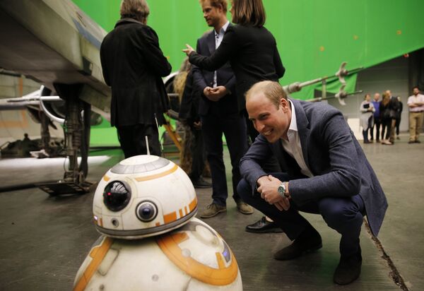 Britain's Prince William looks at BB-8 droid during a tour of the Star Wars sets at Pinewood studios in Iver Heath, west London, Tuesday April 19, 2016 Britain's Prince William looks at BB-8 droid during a tour of the Star Wars sets at Pinewood studios in Iver Heath, west London, Tuesday April 19, 2016 - Sputnik International