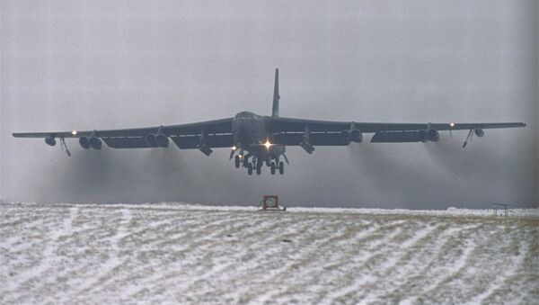 a giant nuclear-equipped USAF B-52 bomber lifts off from the snow covered RAF Fairford runway in Gloucestershire, England, en route to the Gulf - Sputnik International