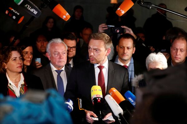 Chairman of the Free Democratic Party (FDP) Christian Lindner, and party members Wolfgang Kubicki and Nicola Beer speak to the press during the exploratory talks about forming a new coalition government in Berlin, Germany, November 19, 2017 Chairman of the Free Democratic Party (FDP) Christian Lindner, and party members Wolfgang Kubicki and Nicola Beer speak to the press during the exploratory talks about forming a new coalition government in Berlin, Germany, November 19, 2017 - Sputnik International