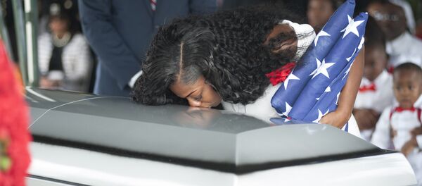 Myeshia Johnson kisses the casket of her husband Army Sgt. La David Johnson during his burial service for at the Memorial Gardens East cemetery on October 21, 2017 in Hollywood, Florida Myeshia Johnson kisses the casket of her husband Army Sgt. La David Johnson during his burial service for at the Memorial Gardens East cemetery on October 21, 2017 in Hollywood, Florida - Sputnik International