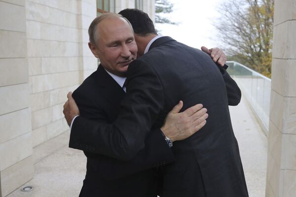 Russian President Vladimir Putin (L) welcomes Syrian President Bashar al-Assad during a meeting in the Black Sea resort of Sochi, Russia November 20, 2017. Picture taken November 20, 2017 Russian President Vladimir Putin (L) welcomes Syrian President Bashar al-Assad during a meeting in the Black Sea resort of Sochi, Russia November 20, 2017. Picture taken November 20, 2017 - Sputnik International