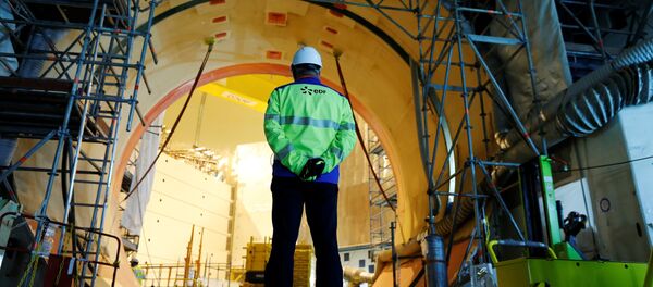 A worker stands in the construction site of the third-generation European Pressurised Water nuclear reactor (EPR) in Flamanville, northwestern France on November 16, 2016 A worker stands in the construction site of the third-generation European Pressurised Water nuclear reactor (EPR) in Flamanville, northwestern France on November 16, 2016 - Sputnik International