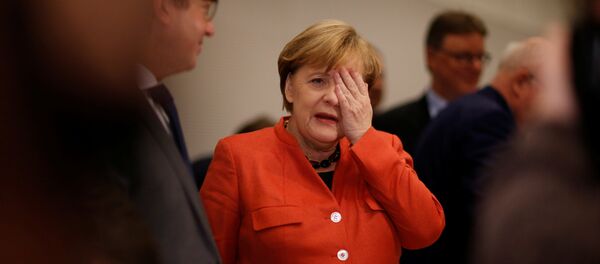 German Chancellor Angela Merkel attends a meeting of the CDU/CSU parliamentary group at the Bundestag in Berlin, Germany, November 20, 2017 - Sputnik International